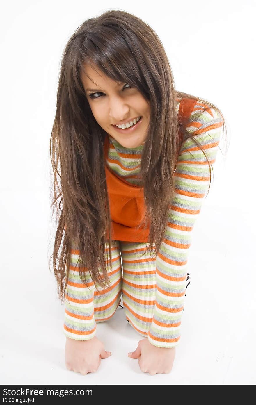 Young brunette girl in orange dress.