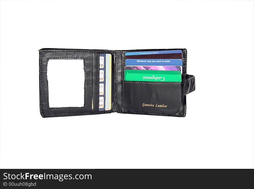 Leather wallet with some credit cards (made up fake cards ) with a clipping path