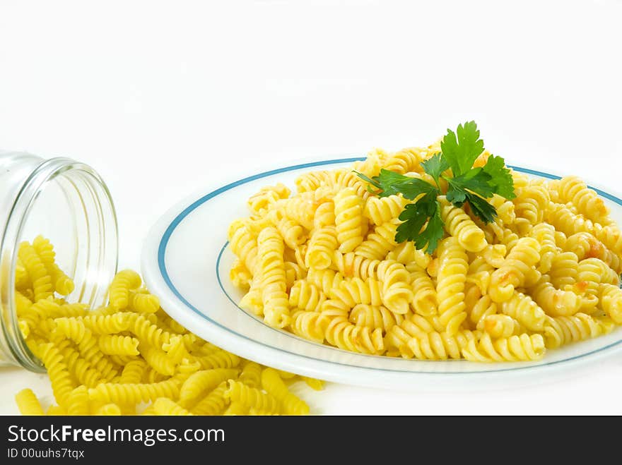 Fusilli and tomato sauce isolated over white. Fusilli and tomato sauce isolated over white.