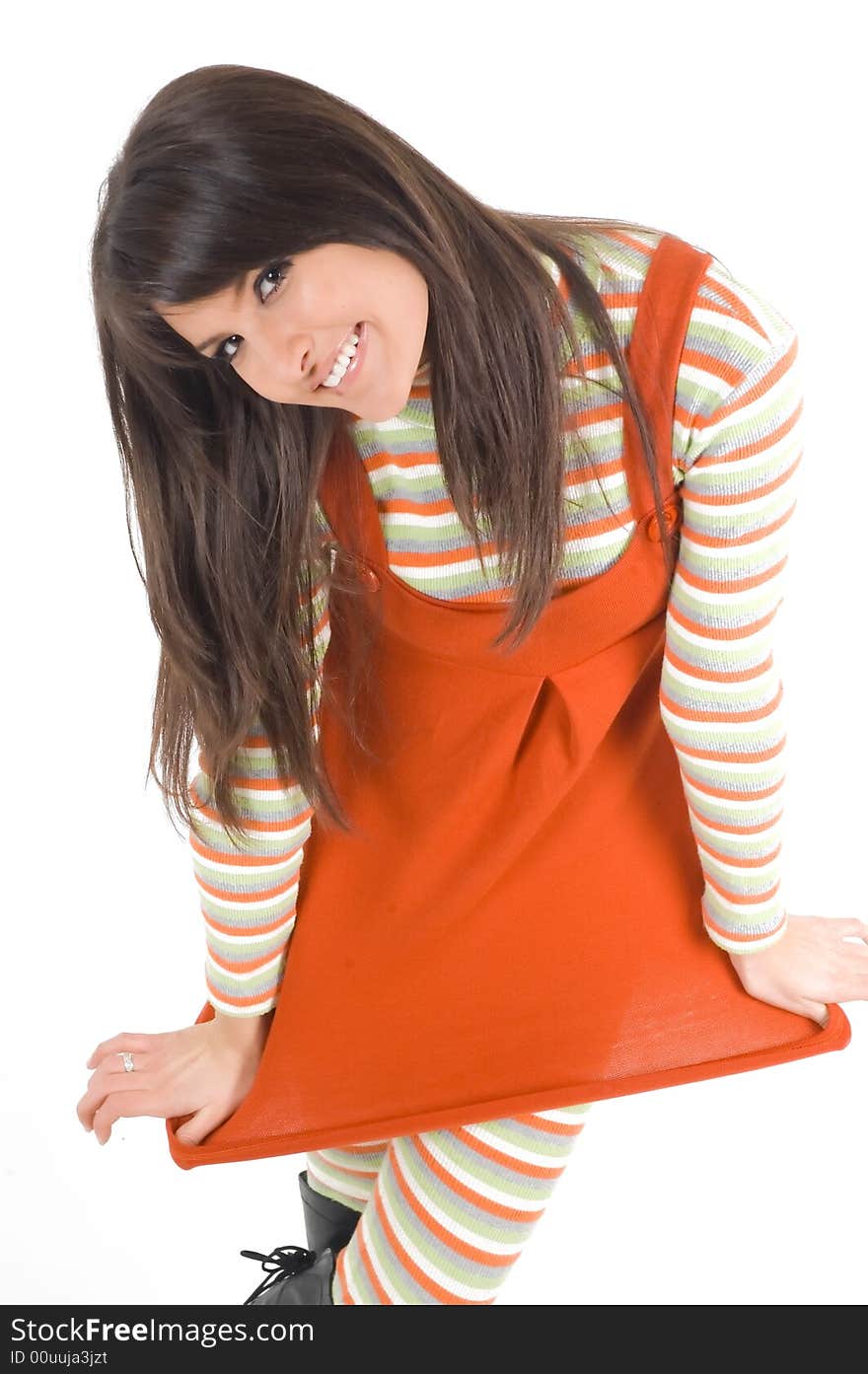 Young brunette girl in orange dress.