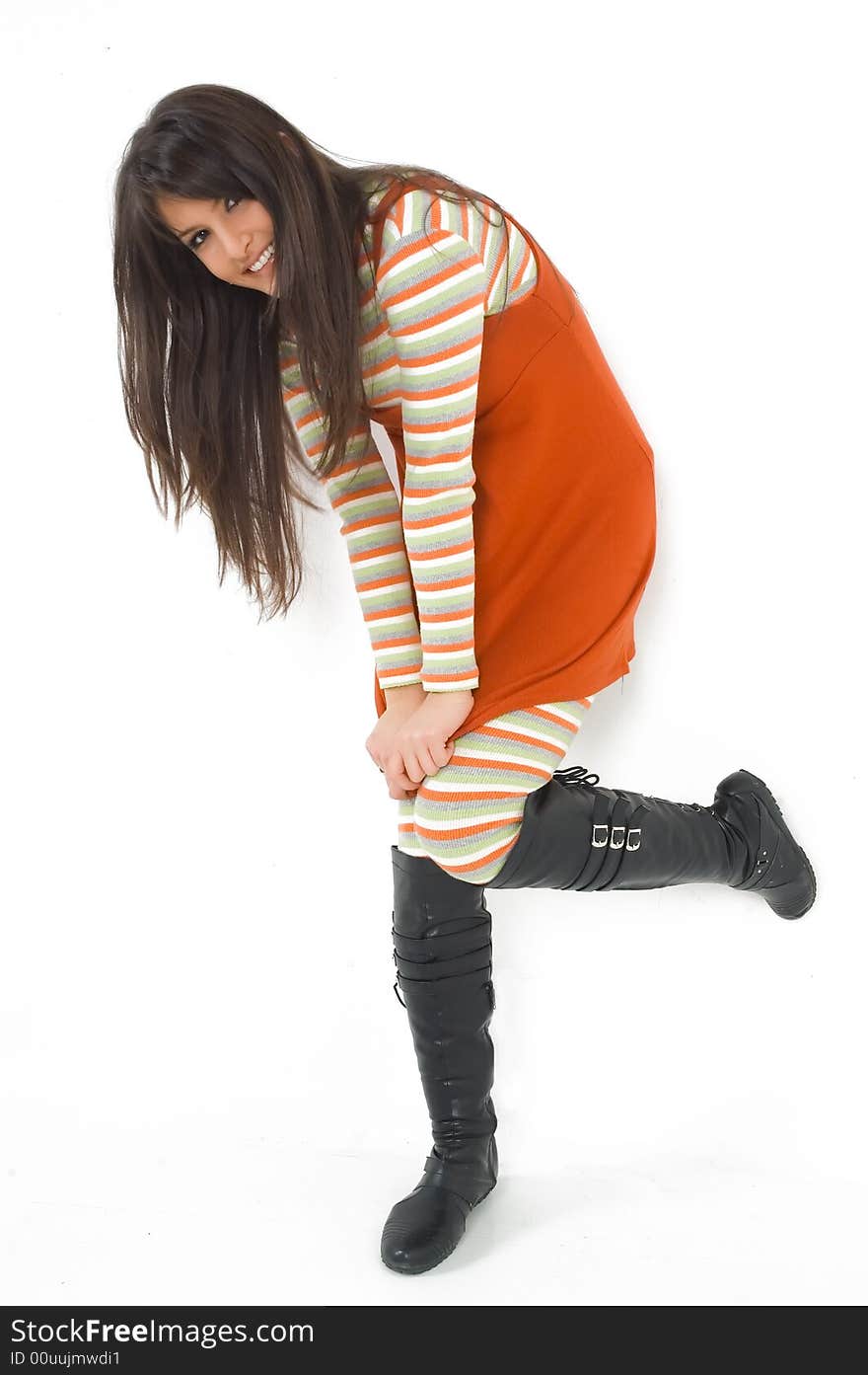 Young brunette girl in orange dress.