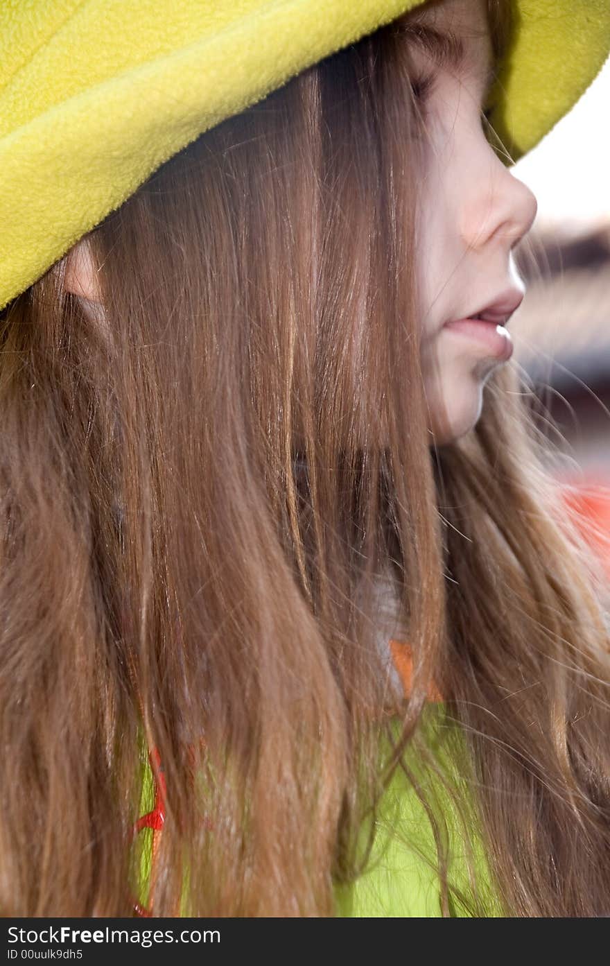 Little pretty girl wearing a green hat. Little pretty girl wearing a green hat