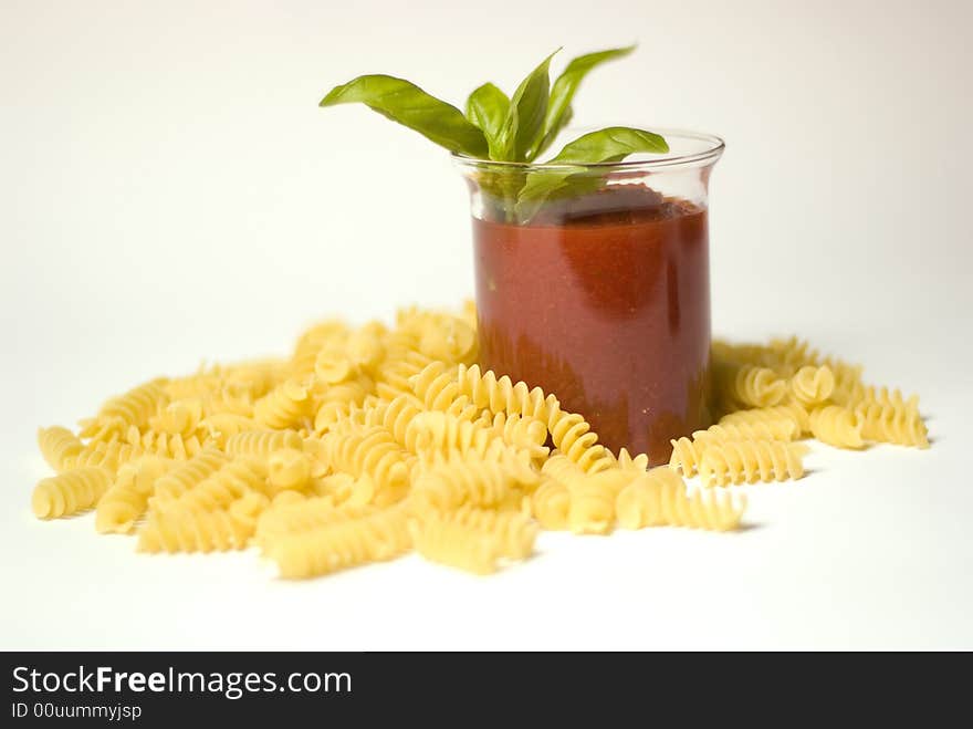 Italian fusilli pasta with tomato sauce annd basil