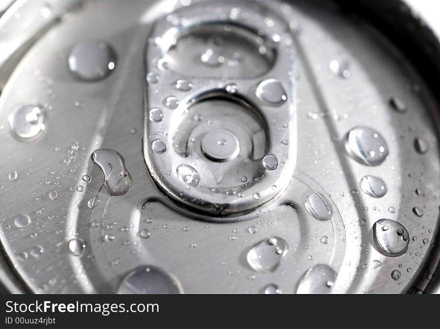 SHallow focus macro of a can of soda with dew from ice