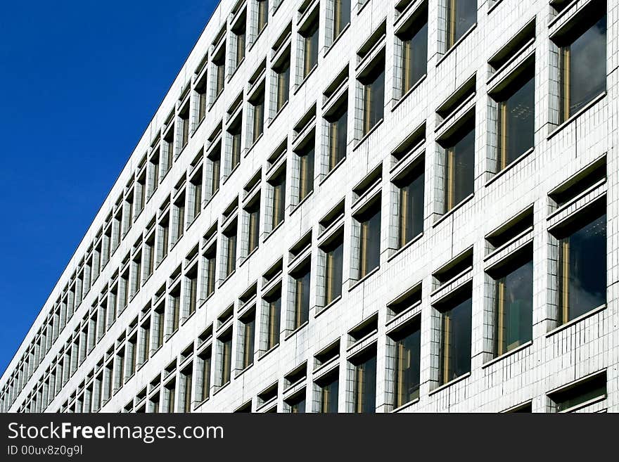 Long white business building with vanishing perspective. Long white business building with vanishing perspective