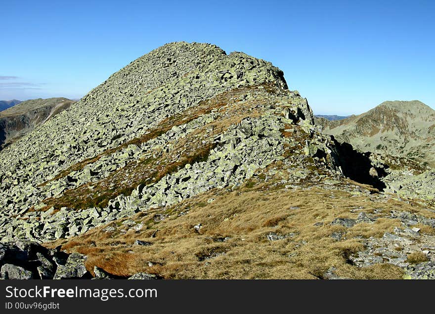 Rocky summit in an autumn morning (Retezat Mountains). Rocky summit in an autumn morning (Retezat Mountains)