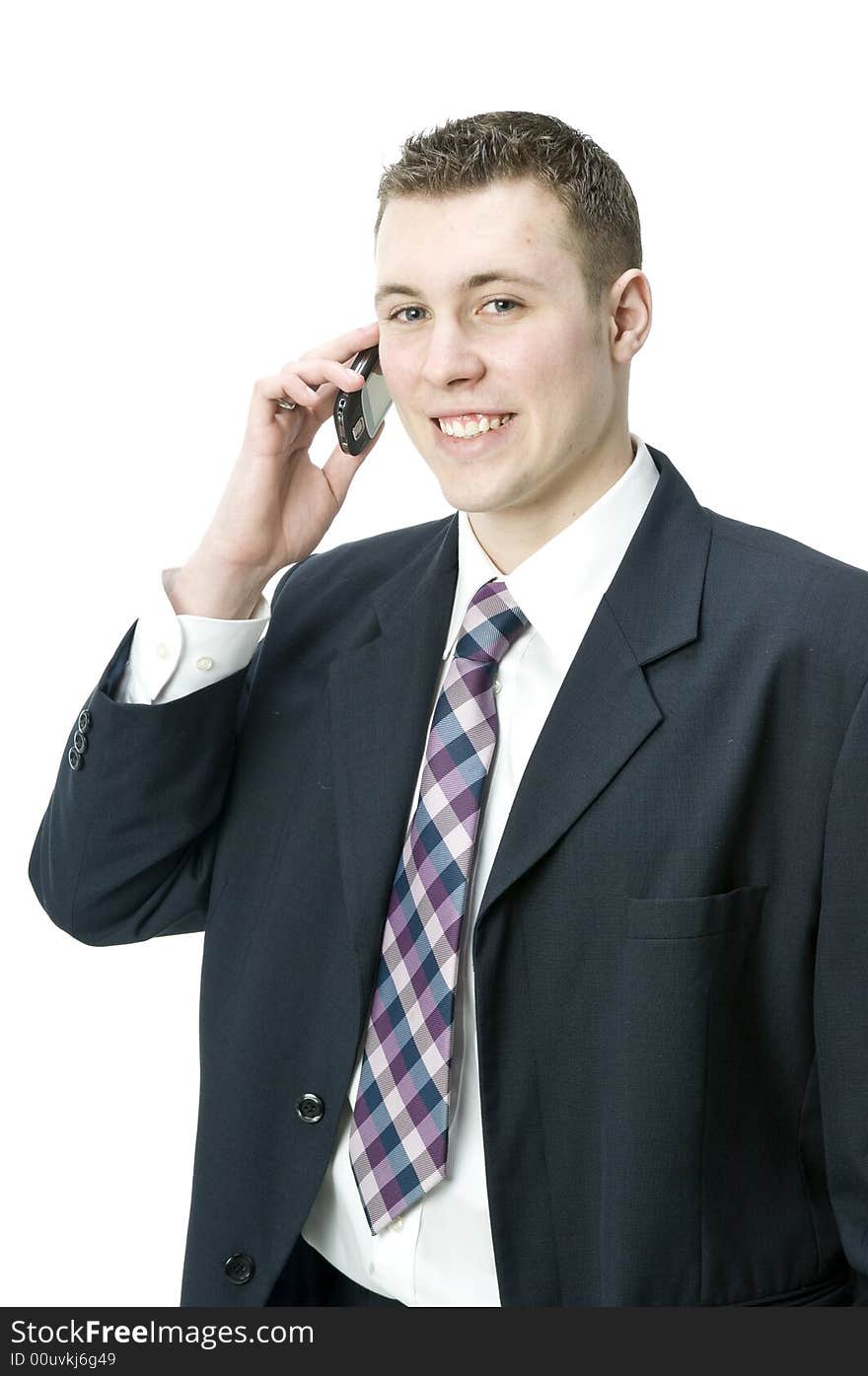 A young handsome businessman using a PDA device