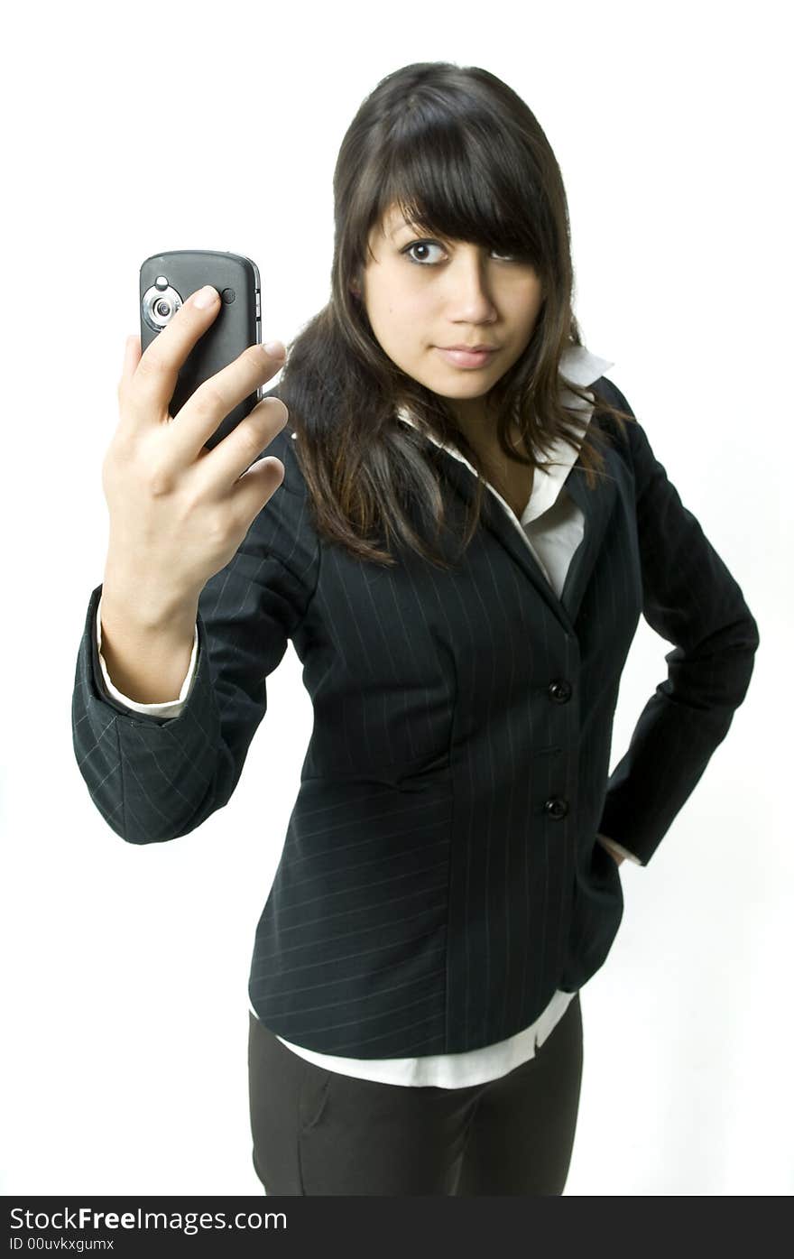 A young business woman using a PDA phone