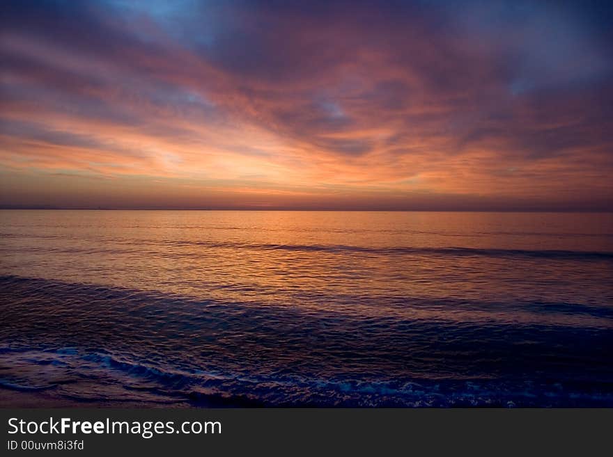 Red Sky.Black sea-Bulgaria-2008 It starts the new day. The sun punctures a road for itself in its oort clouds.Calo.The Bulgarian Black Sea Coast covers the whole eastern border of Bulgaria. Red Sky.Black sea-Bulgaria-2008 It starts the new day. The sun punctures a road for itself in its oort clouds.Calo.The Bulgarian Black Sea Coast covers the whole eastern border of Bulgaria.