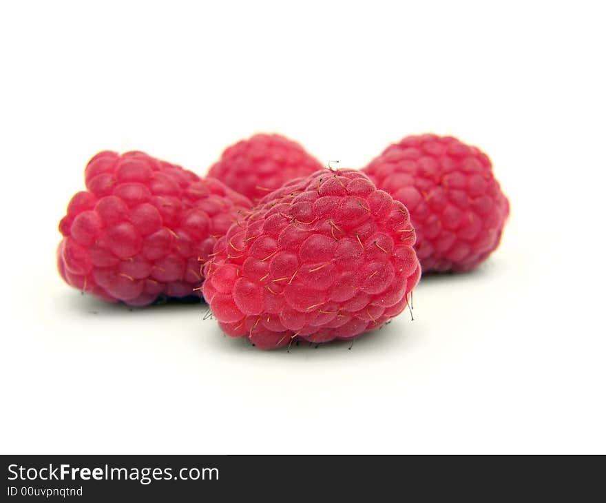 Four mature raspberries