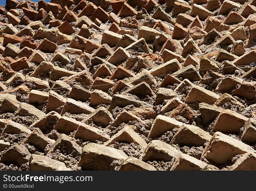 A deteriorating old brick wall. Background.