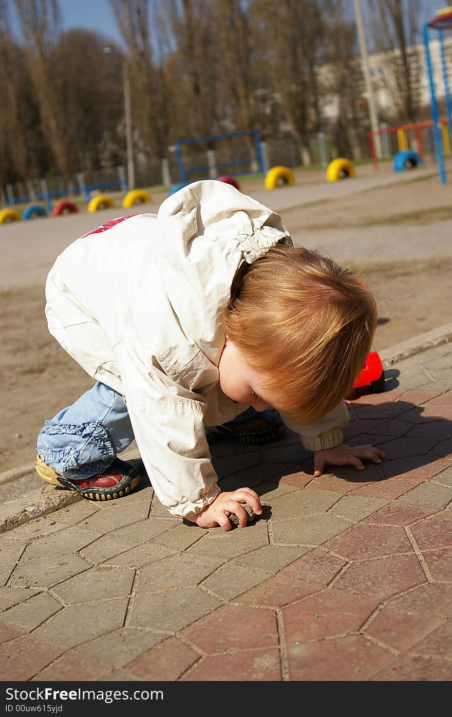 Girl plays on the street