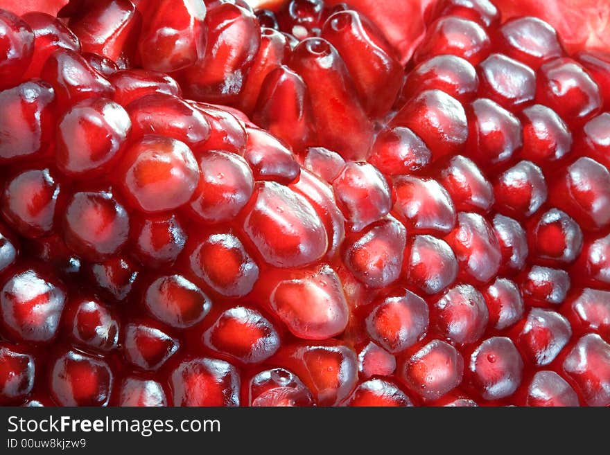 Opened pomegranate, background