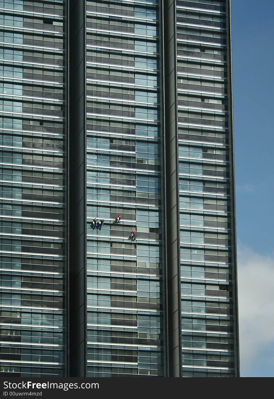 Window cleaners working on a bright 
Sydney day