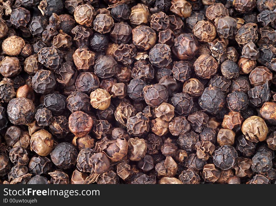 Close-up of peppercorns, top view