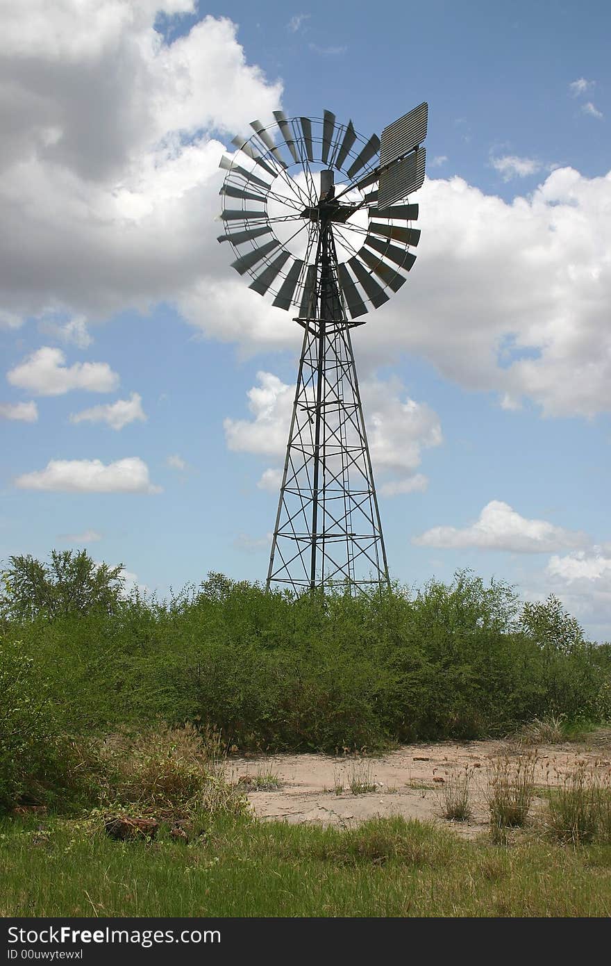 Windmill against azure sky