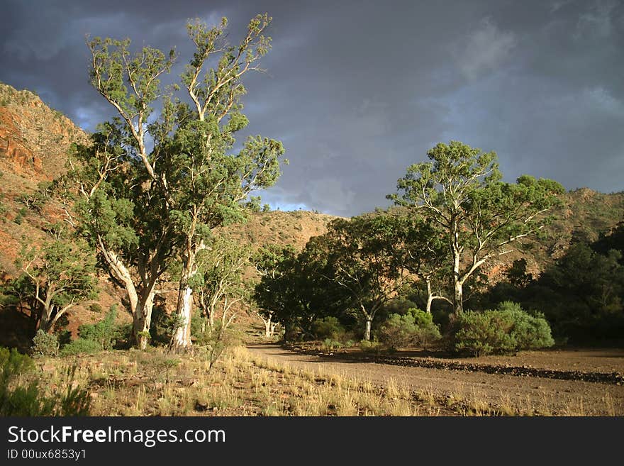 Dramatic gray clouds over the country road. South Australia