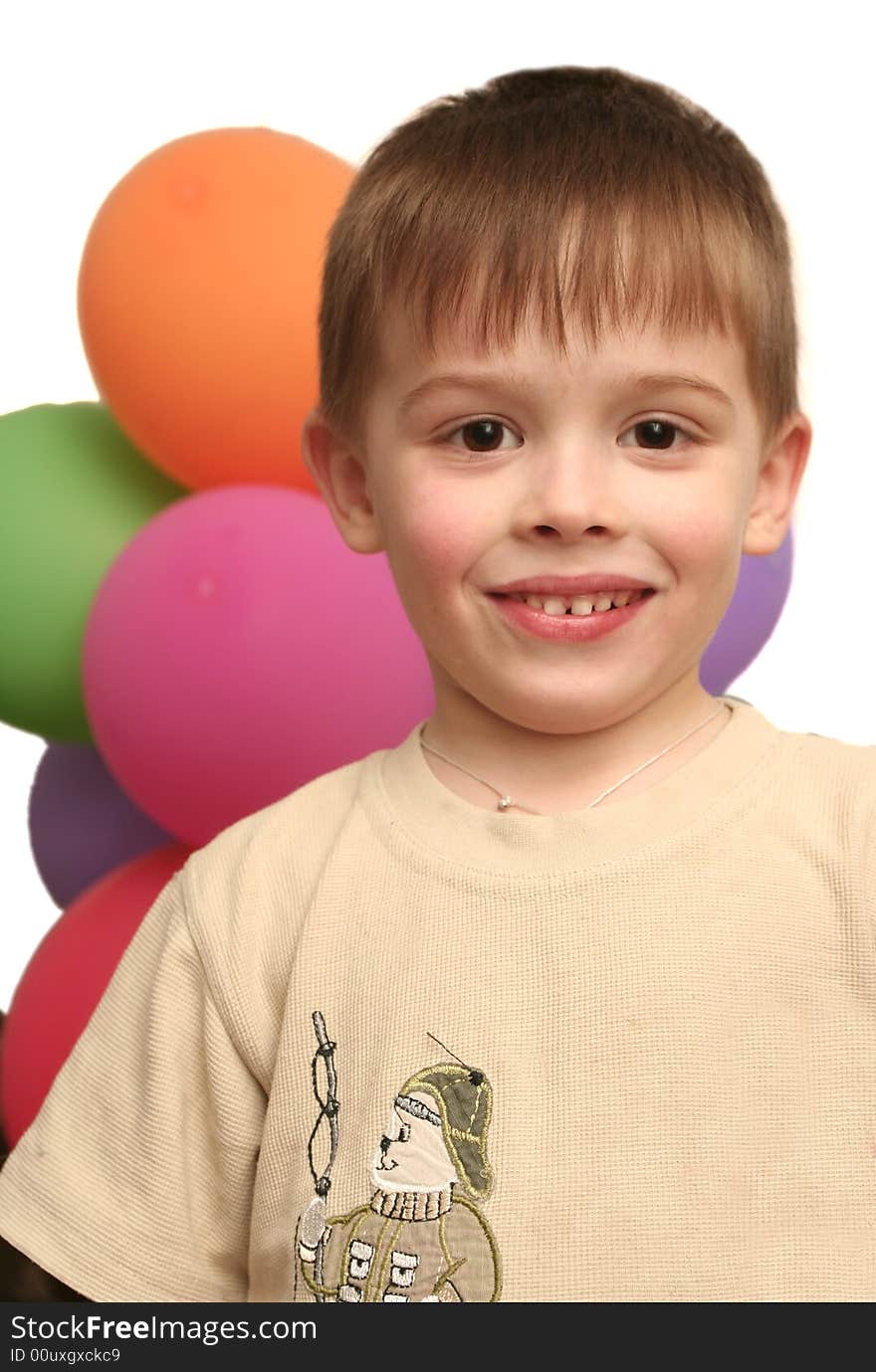 Smile of the lovely boy and balloons