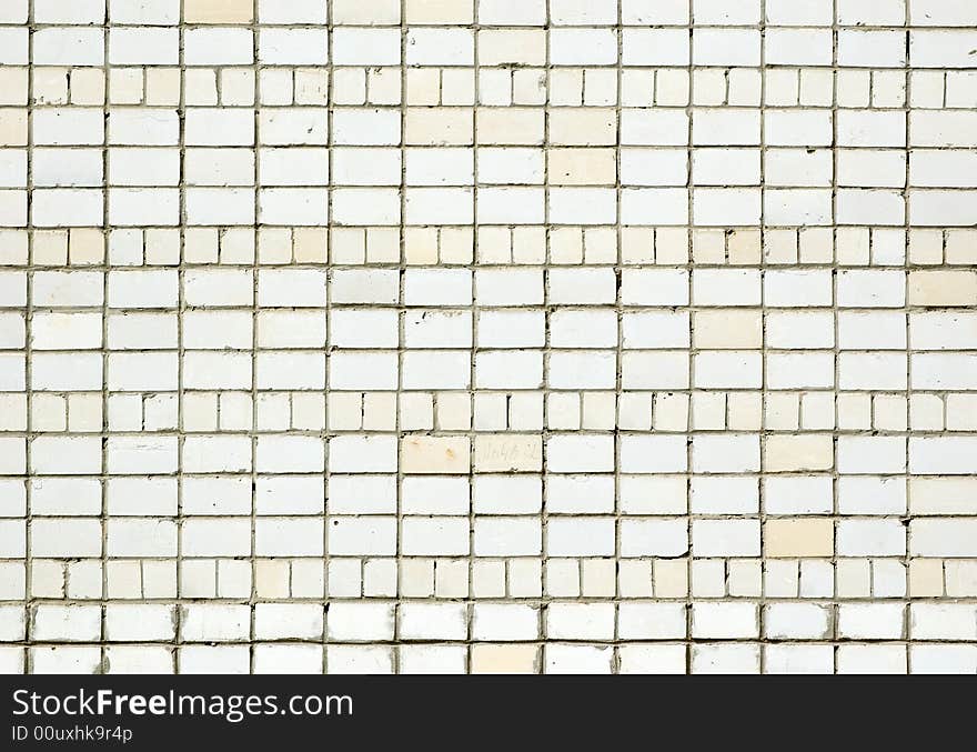 Texture of white wall. Some grades of a brick. Texture of white wall. Some grades of a brick.