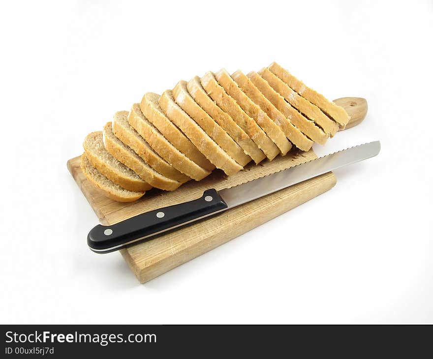 Bread and knife cut isolated on white background