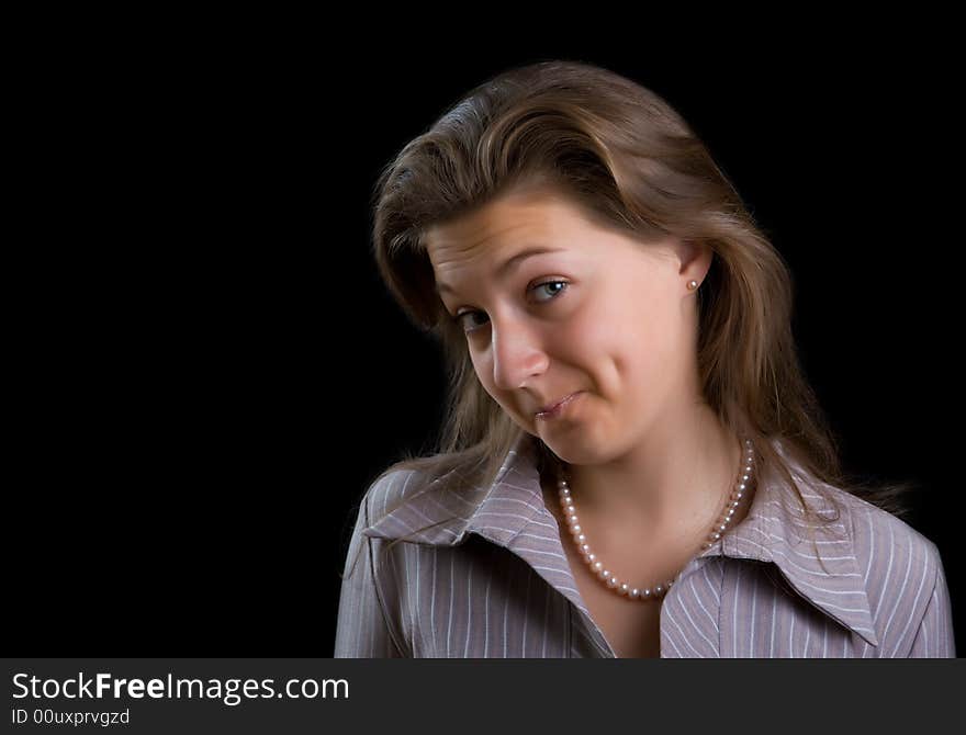 Portrait of the beautiful girl isolated on a black background