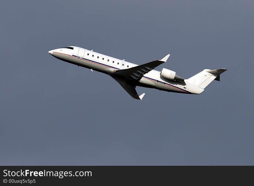 Regional passenger airplane few moments after takeoff. Regional passenger airplane few moments after takeoff