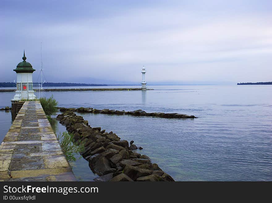 Tranquility lough with two pharos in the morning, geneva lake, switzerland. Tranquility lough with two pharos in the morning, geneva lake, switzerland.