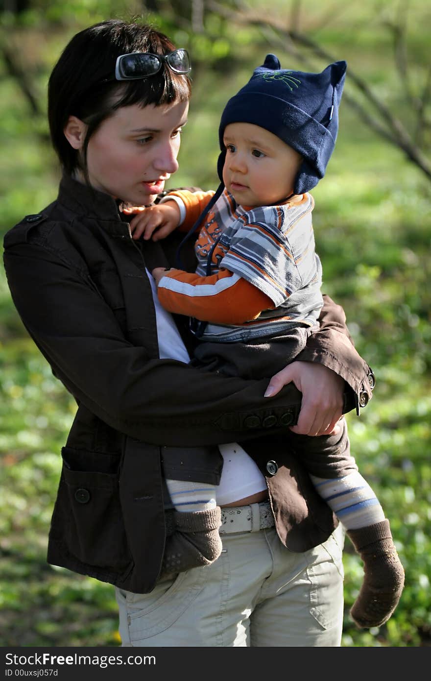 Woman with her baby in the park