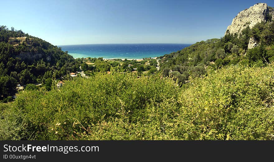 Beach on the Samos island, Greece. Panoramic view from a hill on the island.