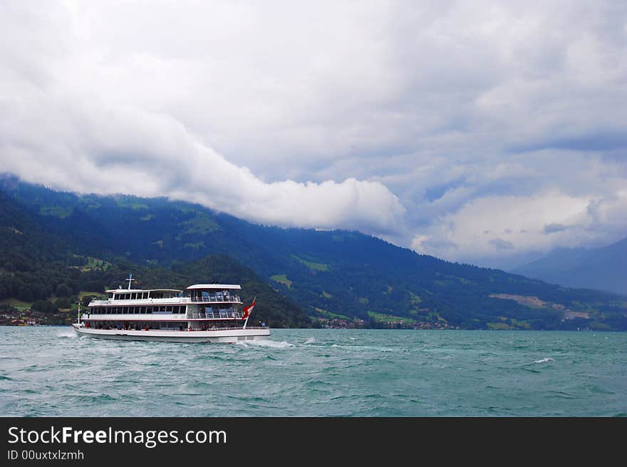 Rainstorm coming，the ship is sailing in Thun lake, switzerland. Rainstorm coming，the ship is sailing in Thun lake, switzerland.