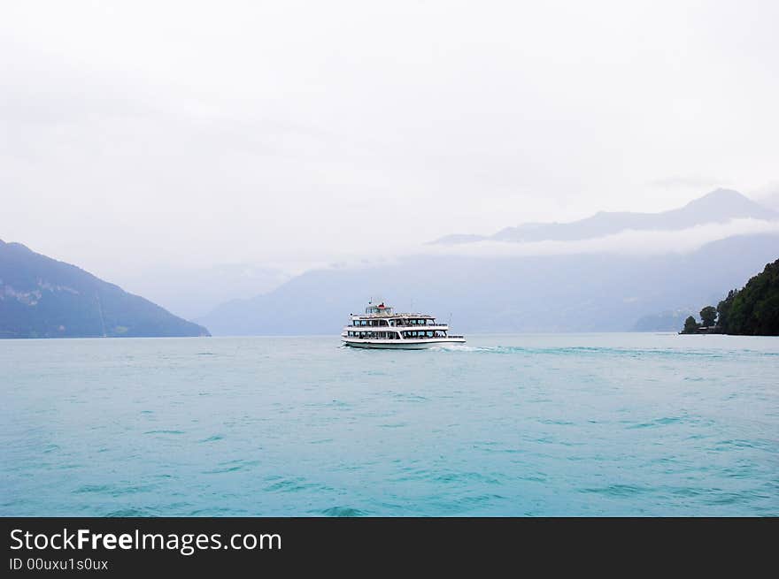 Ship in mist ,at Thun lake, switzerland.