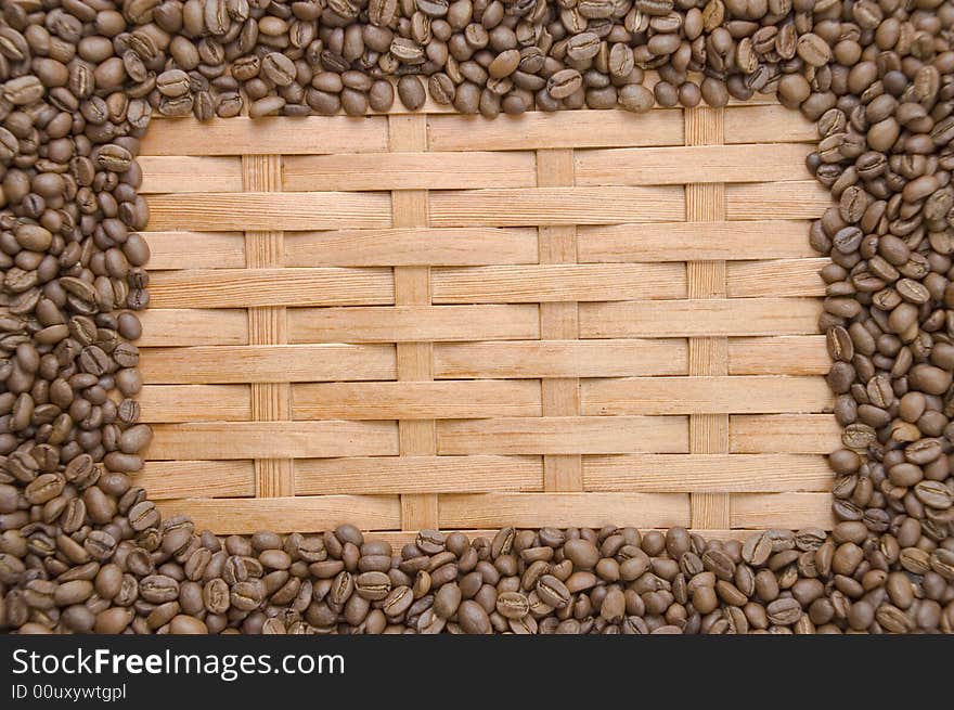 Coffee in grains on a background of a tree. Coffee in grains on a background of a tree.