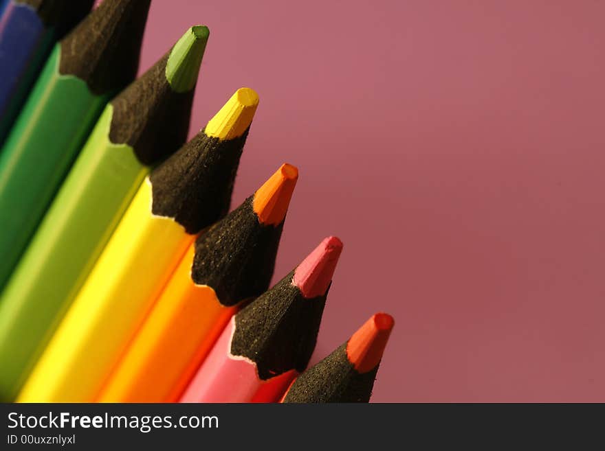 A part of  pencils with a simple  colorful background. A part of  pencils with a simple  colorful background