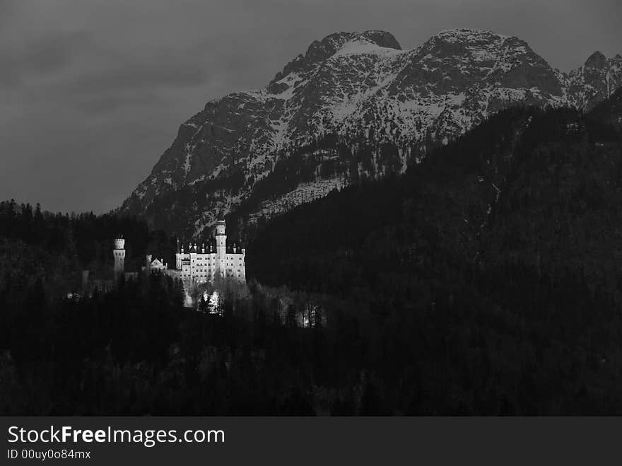 Famous castle Neuschwanstein. Bavaria, Germany. Monochrome photograph.