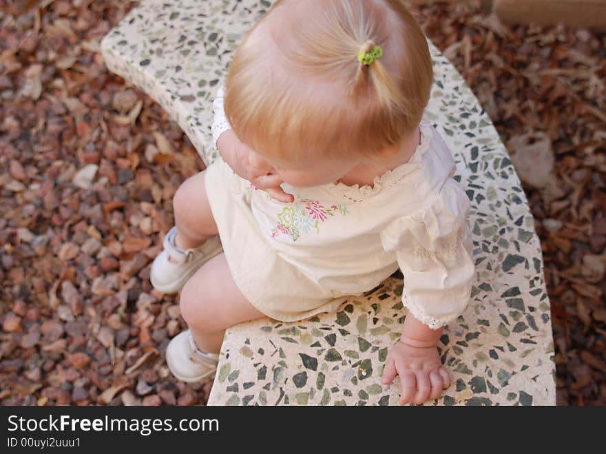 Young Girl On Bench