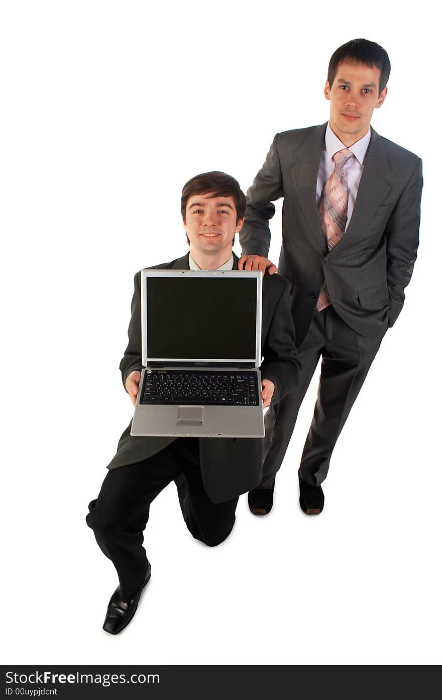 Two young businessmen with notebook one stands on knee