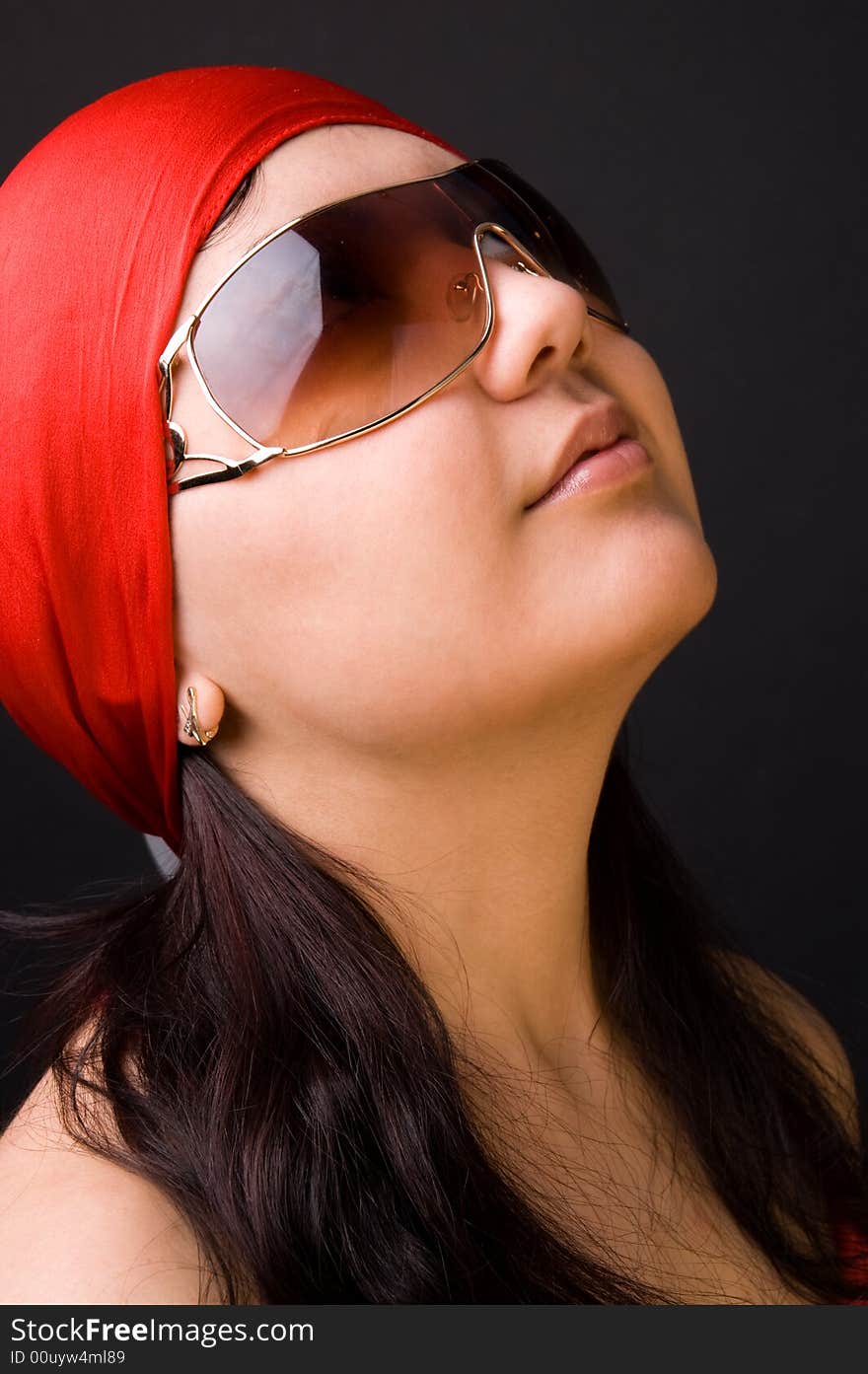 The girl in a red scarf and glasses