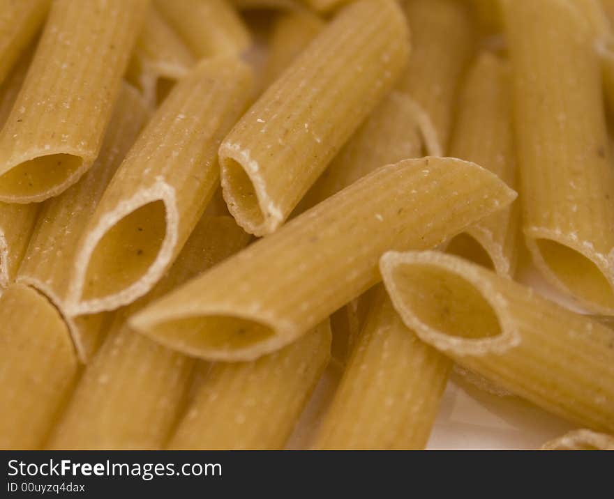 Close up of brown pasta tube