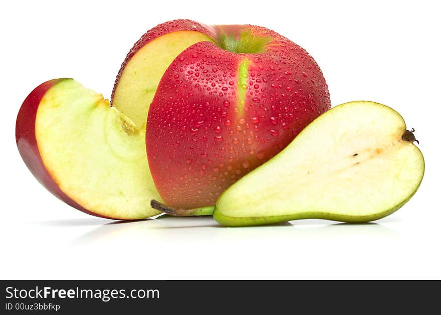 Juicy green pear and ripe red apple. Isolated, shallow DOF.