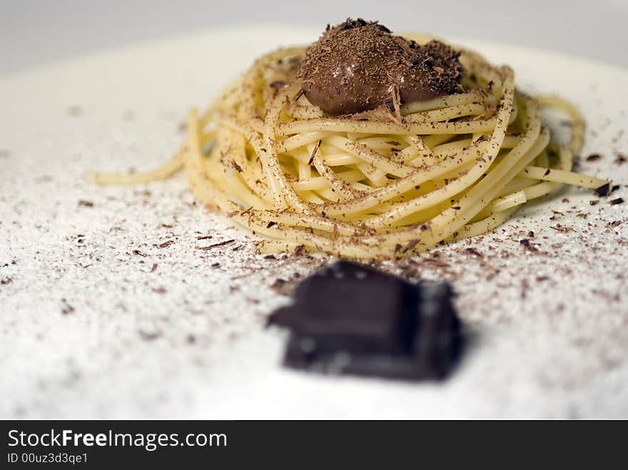 Dessert with chocolate and sweet spaghetti. Dessert with chocolate and sweet spaghetti