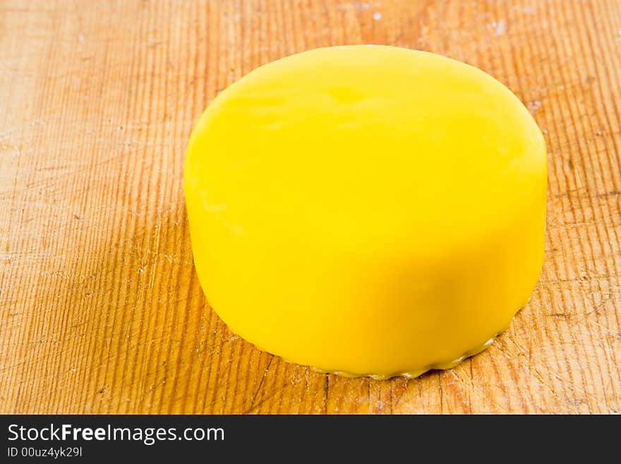 Cheese in yellow wax