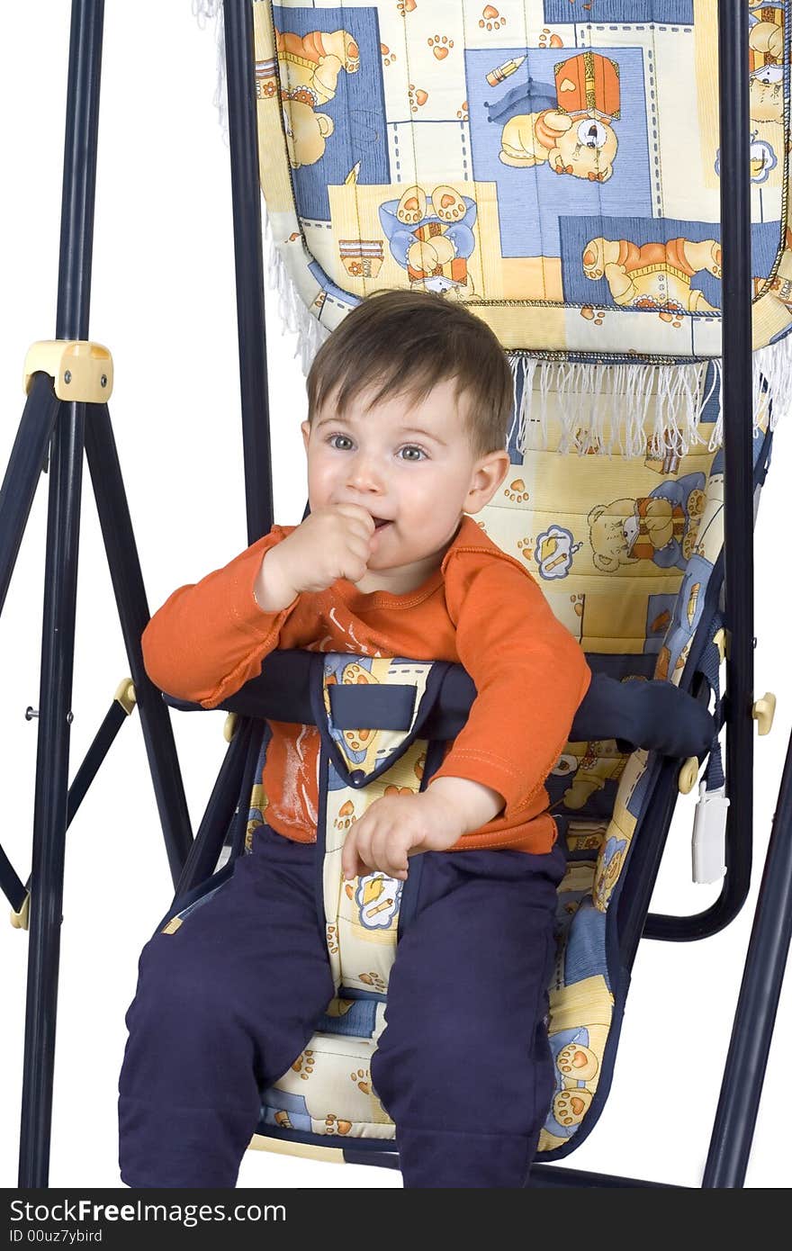 Smiling boy on swing  isolated on white background