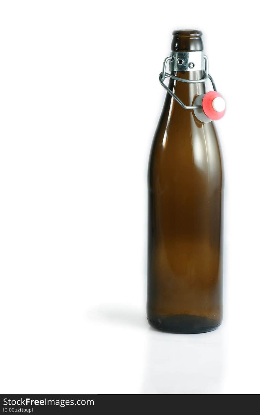 A single empty bottle over a white background