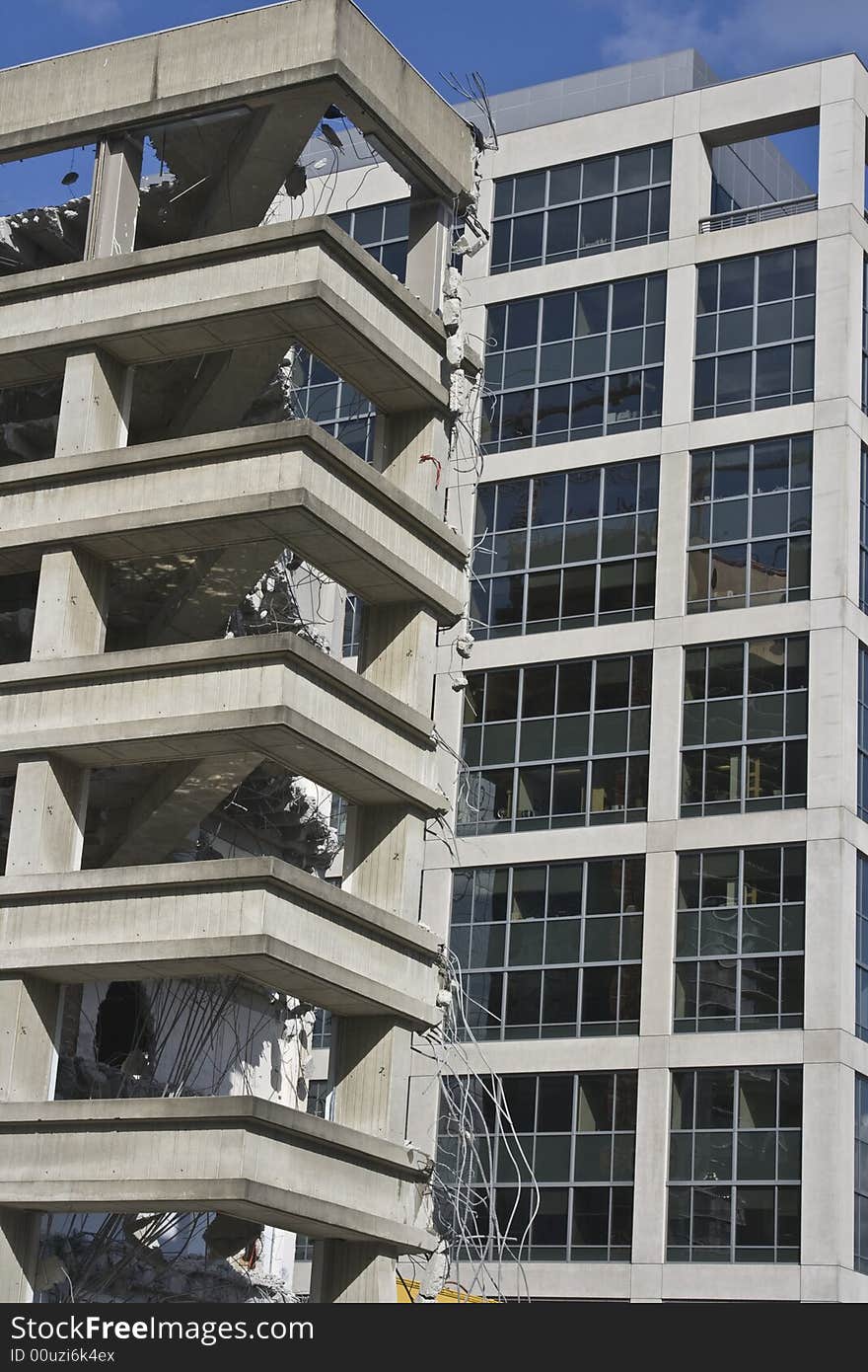 Modern demolition and building construction in an urban downtown