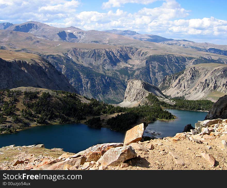 A look at the Yellow stone lake below from a mountain peek