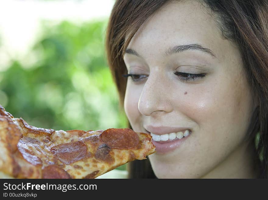 Girl Eating Pizza