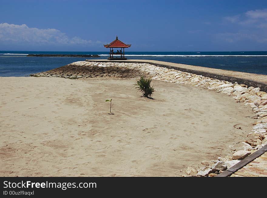 Beach huts at the end of a path. Relax in Bali. Beach huts at the end of a path. Relax in Bali