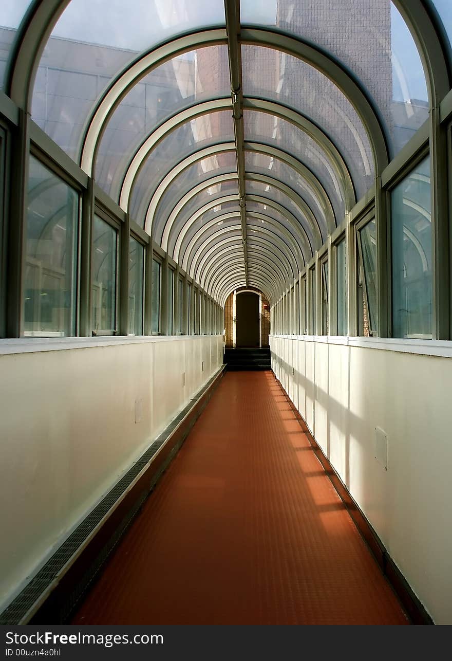 Brightly Lit Perspective of Long Hallway