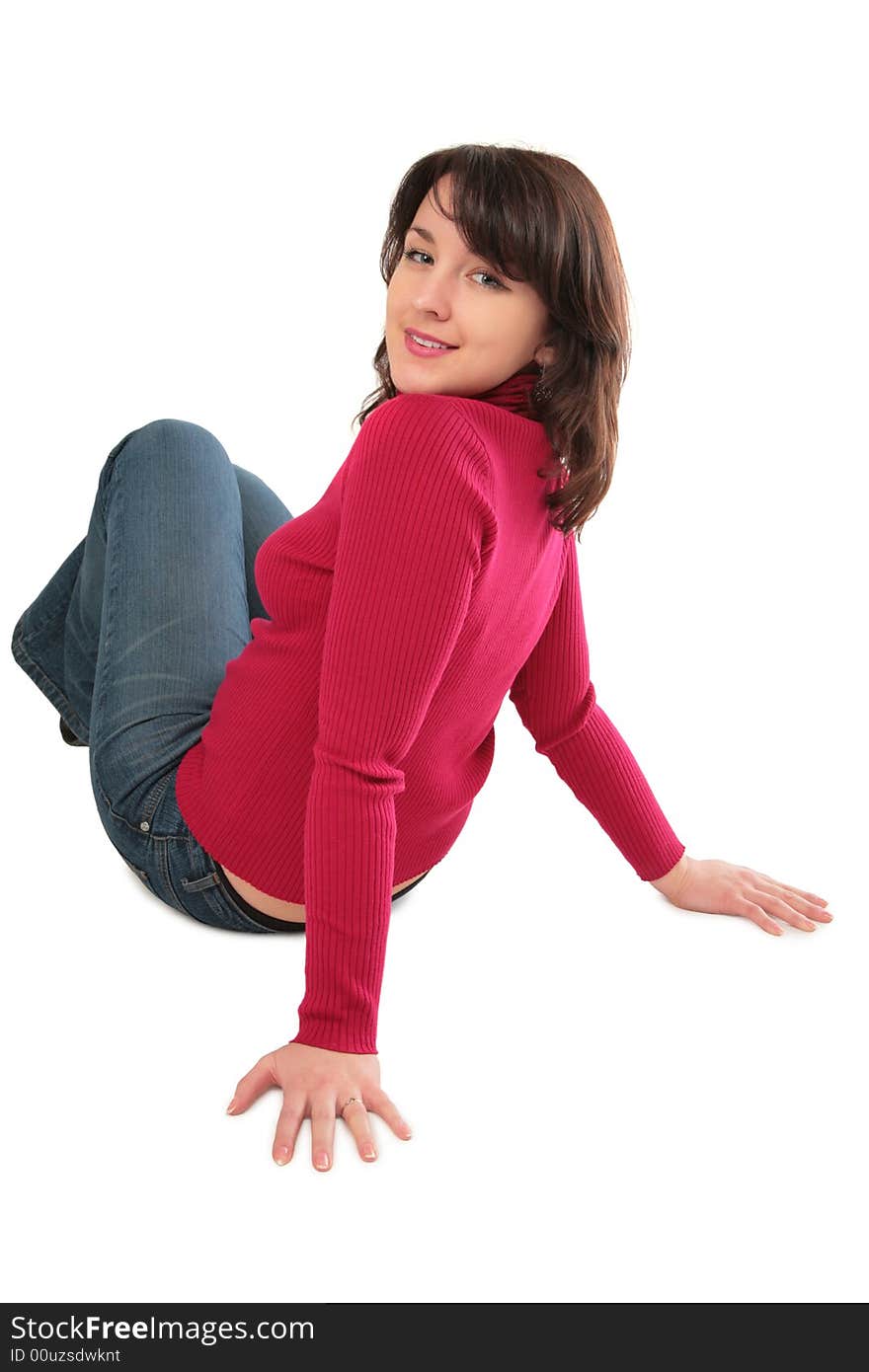 Young woman sits on floor