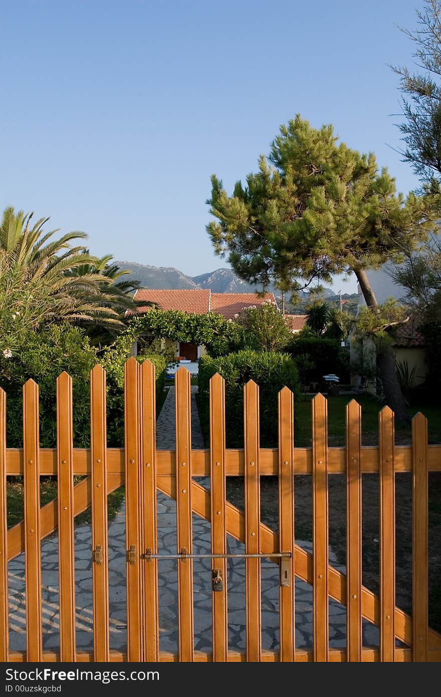 Hidden greek house in a paradise garden. Hidden greek house in a paradise garden